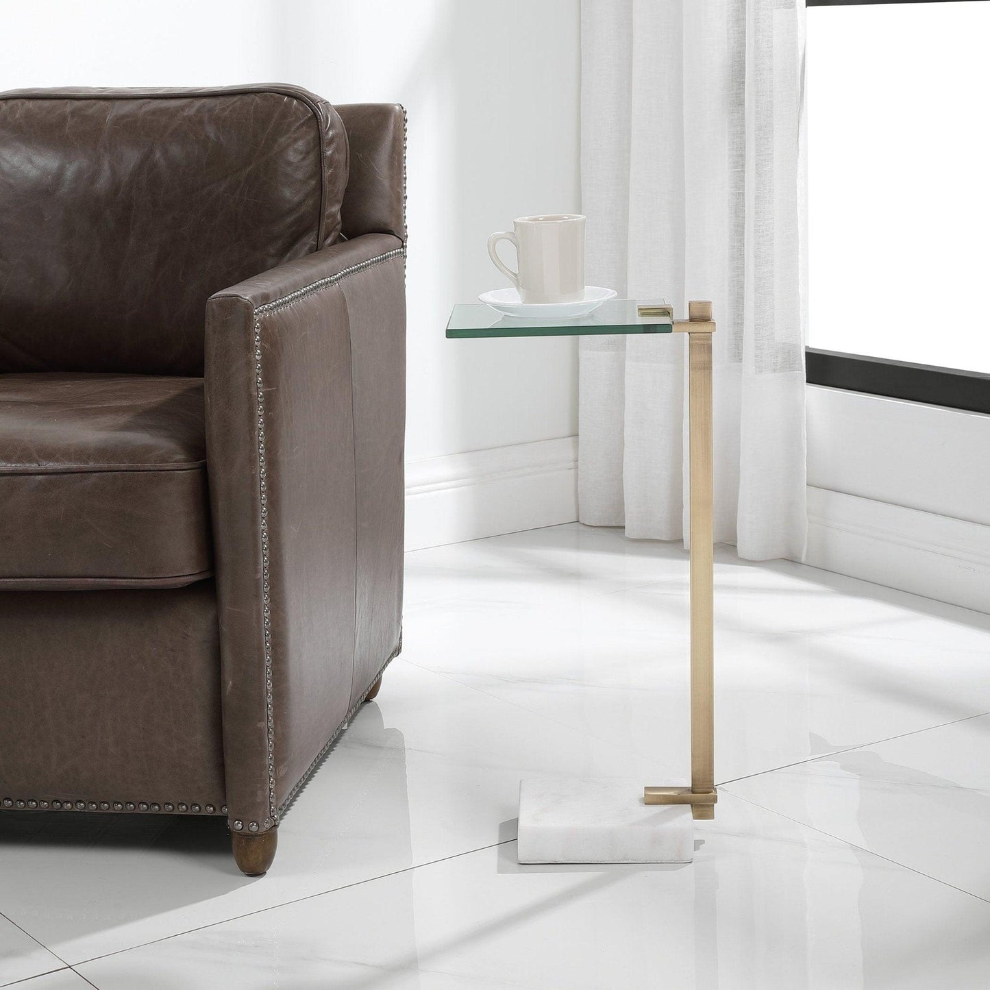 Butler Brass Accent Table.
