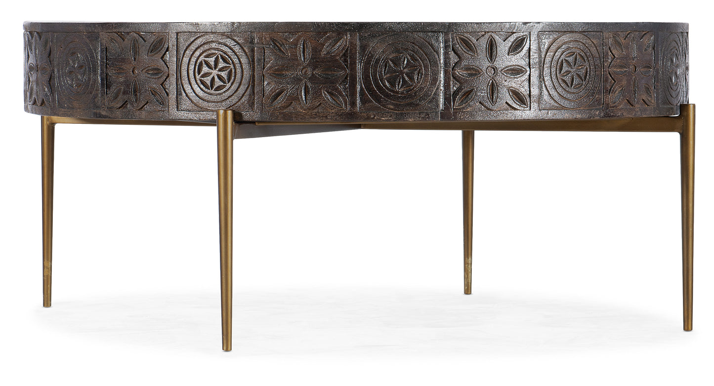 Commerce & Market Carved Round Cocktail Table.