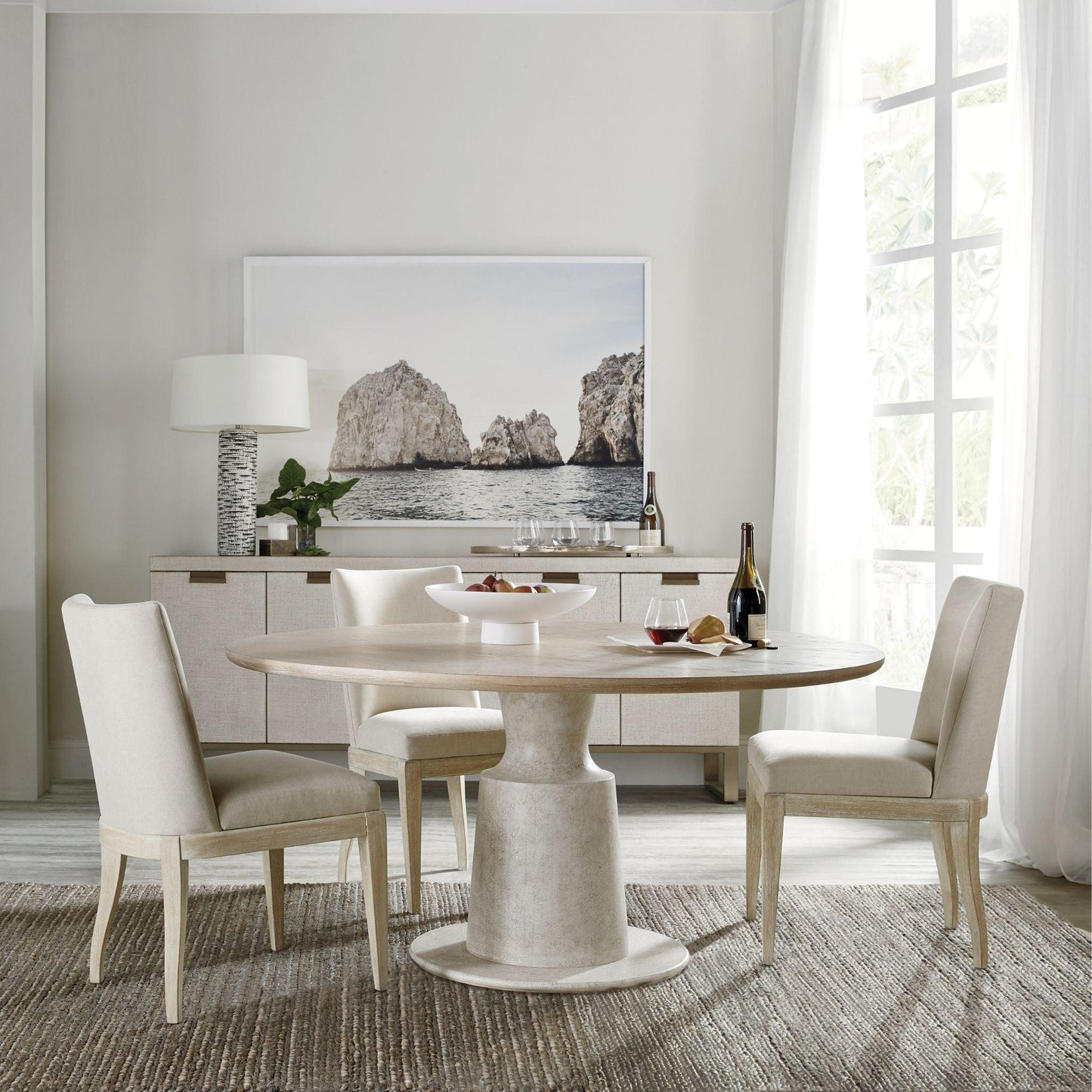 Cascade Pedestal Round Dining Table.