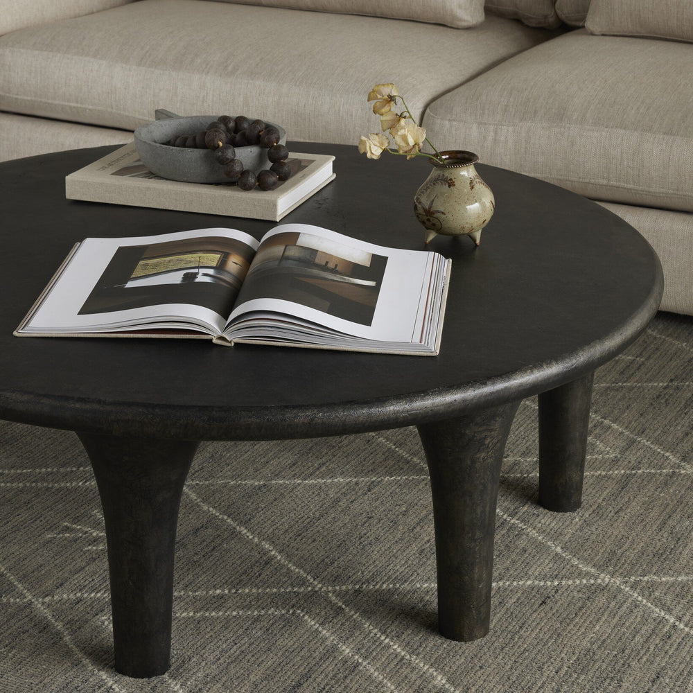 
                      
                        Kelden Coffee Table - Raw Black
                      
                    