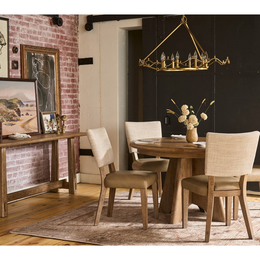 
                      
                        Sienna Round Dining Table
                      
                    