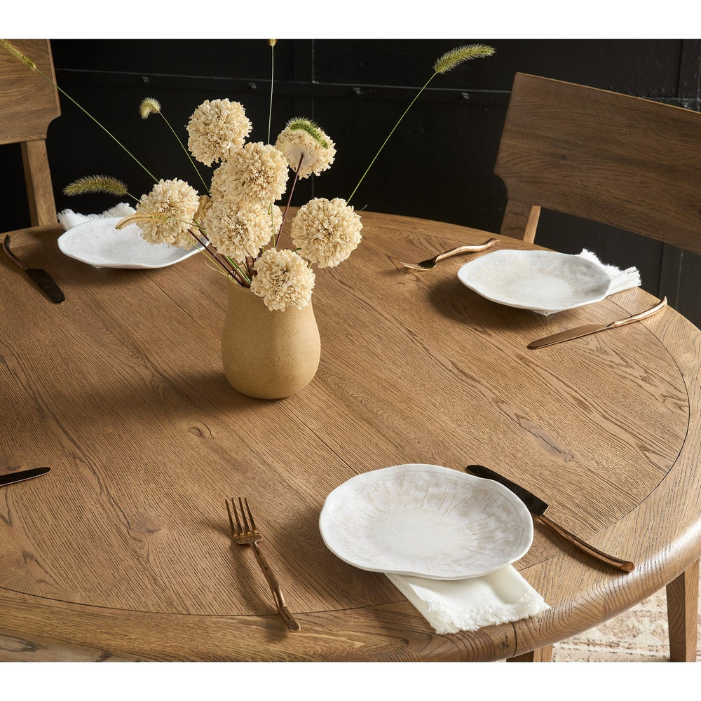 
                      
                        Sienna Round Dining Table
                      
                    
