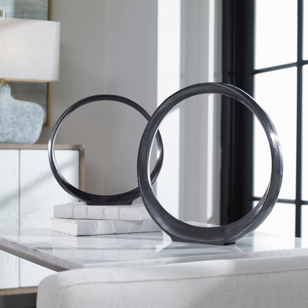 
                      
                        Orbits Black Ring Sculptures, S/2 - #shop_name Accessories
                      
                    